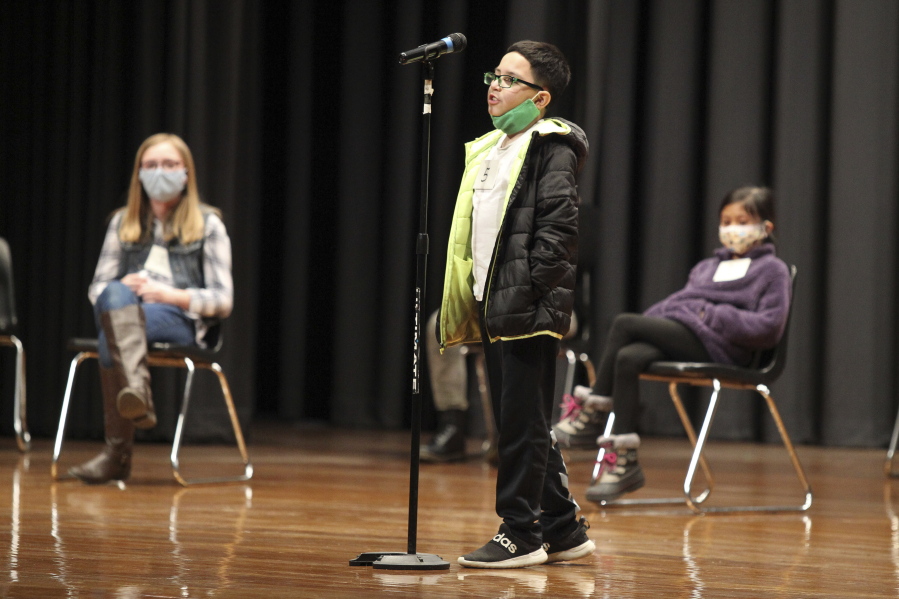 Giovanni Flores, a student at Rankin Elementary School, competes in the Tupelo Public School Disctict and Lee County Spelling Bee on Thursday, Jan. 14, 2021, at the Civic Auditorium of Tupelo Middle School in Tupelo, Miss. Mason Cordell, a seventh grader at Tupelo Middle School was this year&#039;s winner.