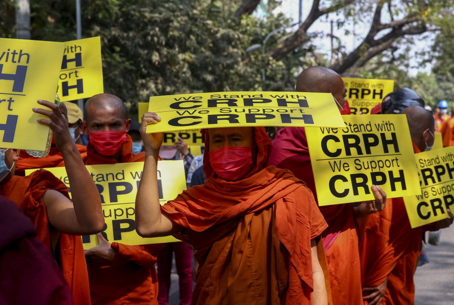 Buddhist monks lead an anti-coup protest march in Mandalay, Myanmar, Saturday, Feb. 27, 2021. Myanmar security forces cracked down on anti-coup protesters in the country&#039;s second-largest city Mandalay on Friday, injuring at least three people, two of whom were shot in the chest by rubber bullets and another who suffered a wound on his leg.