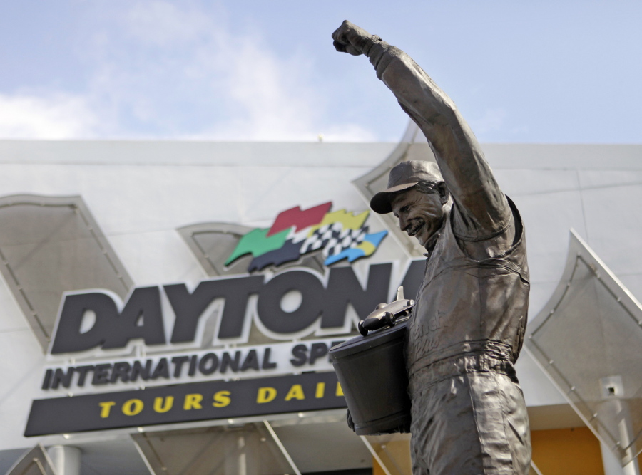 FILE - In this Feb. 16, 2011, file photo, a statue of Dale Earnhardt rises above an entrance at Daytona International Speedway in Daytona Beach, Fla. On the cusp of a national popularity explosion, NASCAR never stopped after the deaths of Adam Petty, Kenny Irwin Jr. and Tony Roper. But losing Earnhardt forced the stock car series to confront safety issues it had been slow to even acknowledge, let alone address. The dramatic upgrades have saved multiple lives -- NASCAR has not suffered a racing death in its three national series since -- and are the hallmark of Earnhardt&#039;s legacy.