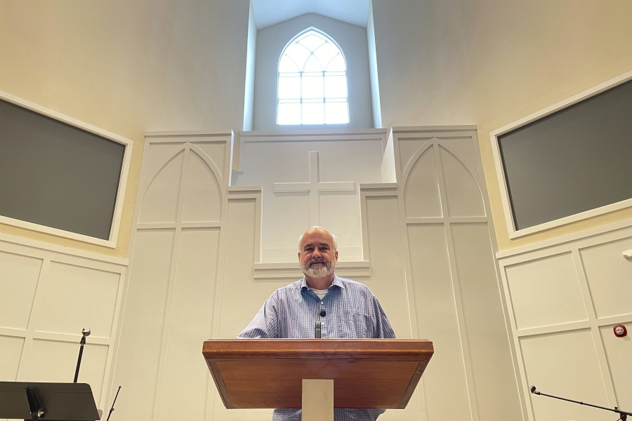 FILE - In this Thursday, Feb. 18, 2021 file photo, Pastor Jim Conrad stands in the Towne View Baptist Church in Kennesaw, Ga. In its 2021 meeting, the Southern Baptist Convention&#039;s executive committee voted to oust the church for allowing LGBTQ people to become members of its congregation.