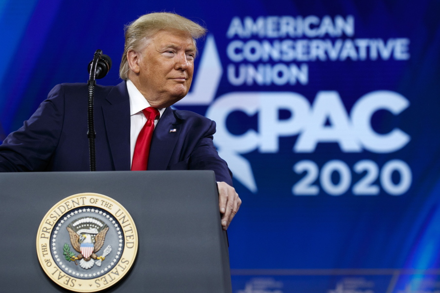 FILE - In this Feb. 29, 2020 file photo, President Donald Trump pauses while speaking at the Conservative Political Action Conference, CPAC 2020, at National Harbor, in Oxon Hill, Md.