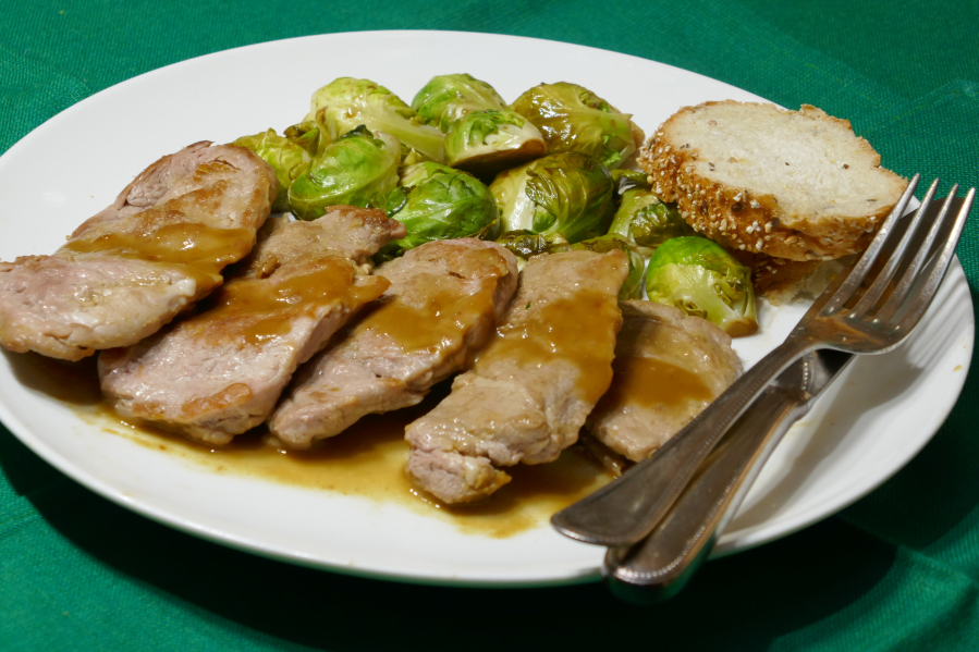 Whiskey Mustard-Crusted Pork with Balsamic Glazed Brussels Sprouts.