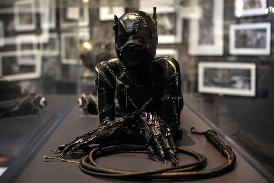 A Catwoman costume from the 1992 &quot;Batman Returns&quot; film worn by Michelle Pfeiffer and designed by Rob Ringwood and Mary Vogt is on display in 2018 at the &quot;DC Comics Exhibition: Dawn Of Super-Heroes&quot; at the O2 Arena in London, England.