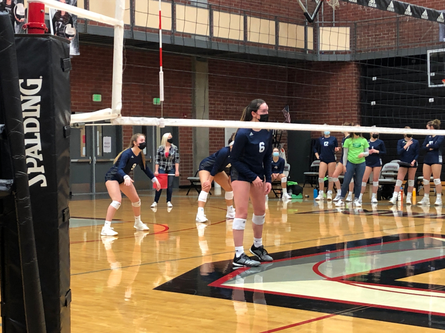 The Skyview volleyball team, including Riley Hill (6), gets ready for a point against Union on Wednesday. The Storm won 3-1.
