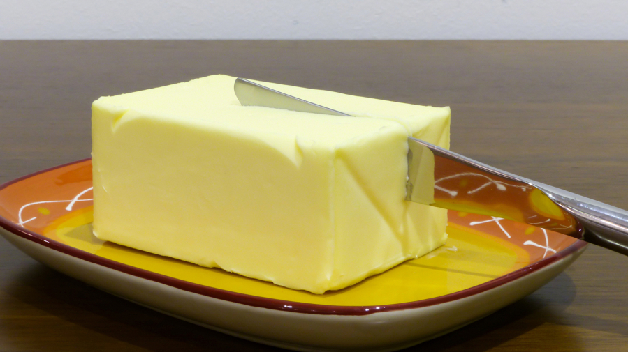Butter is a dairy product, made from the milk or cream of cows. Margarine is made from vegetable oil.