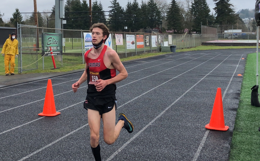 Camas junior Evan Jenkins crosses the finish line at the 4A Greater St. Helens League cross country meet on Wednesday at Battle Ground High School. It was likely the final high school cross country race here for Jenkins, who plans to move with his family to Israel for his senior year.