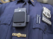A police officer wears a newly issued body camera outside the 34th precinct in New York in 2017. The Clark County Sheriff&#039;s Office would like to start a pilot program to use body cameras.