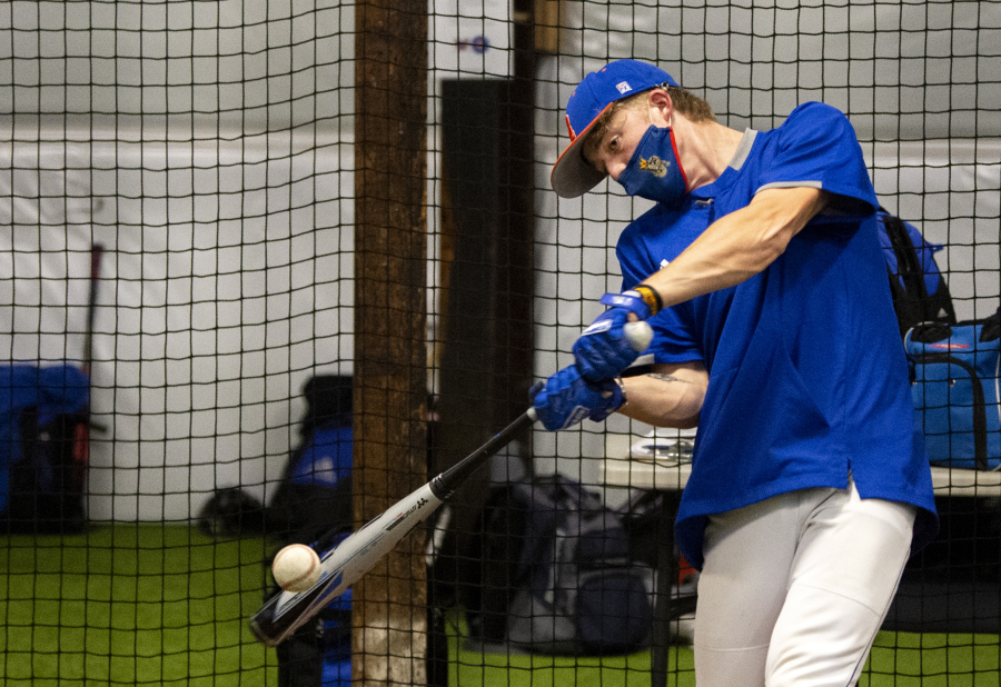 Ridgefield senior Aidan Hundt swings during batting practice. Hundt sustained a broken leg his sophomore year playing football, but is back on the diamond and ready to lead the Spudders.