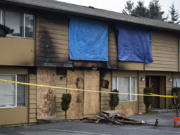 The aftermath of a fatal fire at Date Park Condominiums in Vancouver's Harney Heights neighborhood is pictured Wednesday morning.
