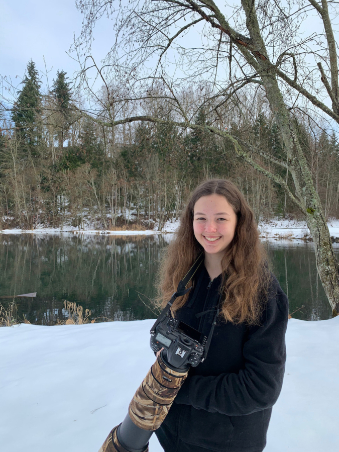 Katie Warner, 13, shown here with her camera near Salmon Creek, was recently named the American Birding Association's 2021 Young Birder of the Year.