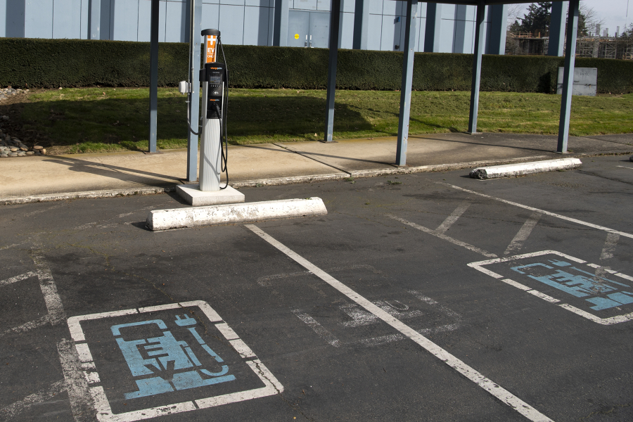 An electric vehicle charging station outside the Clark Public Utilities administration building. The utility&#039;s commission approved a Transportation Electrification plan Tuesday that will include multiple programs offering rebates for vehicle charging infrastructure.