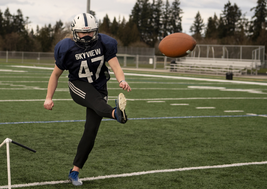 Skyview senior Jordan Mann kicks a field goal during a practice on Tuesday, March 9, 2021, at Skyview High School. Mann joined the football team this year as a kicker.