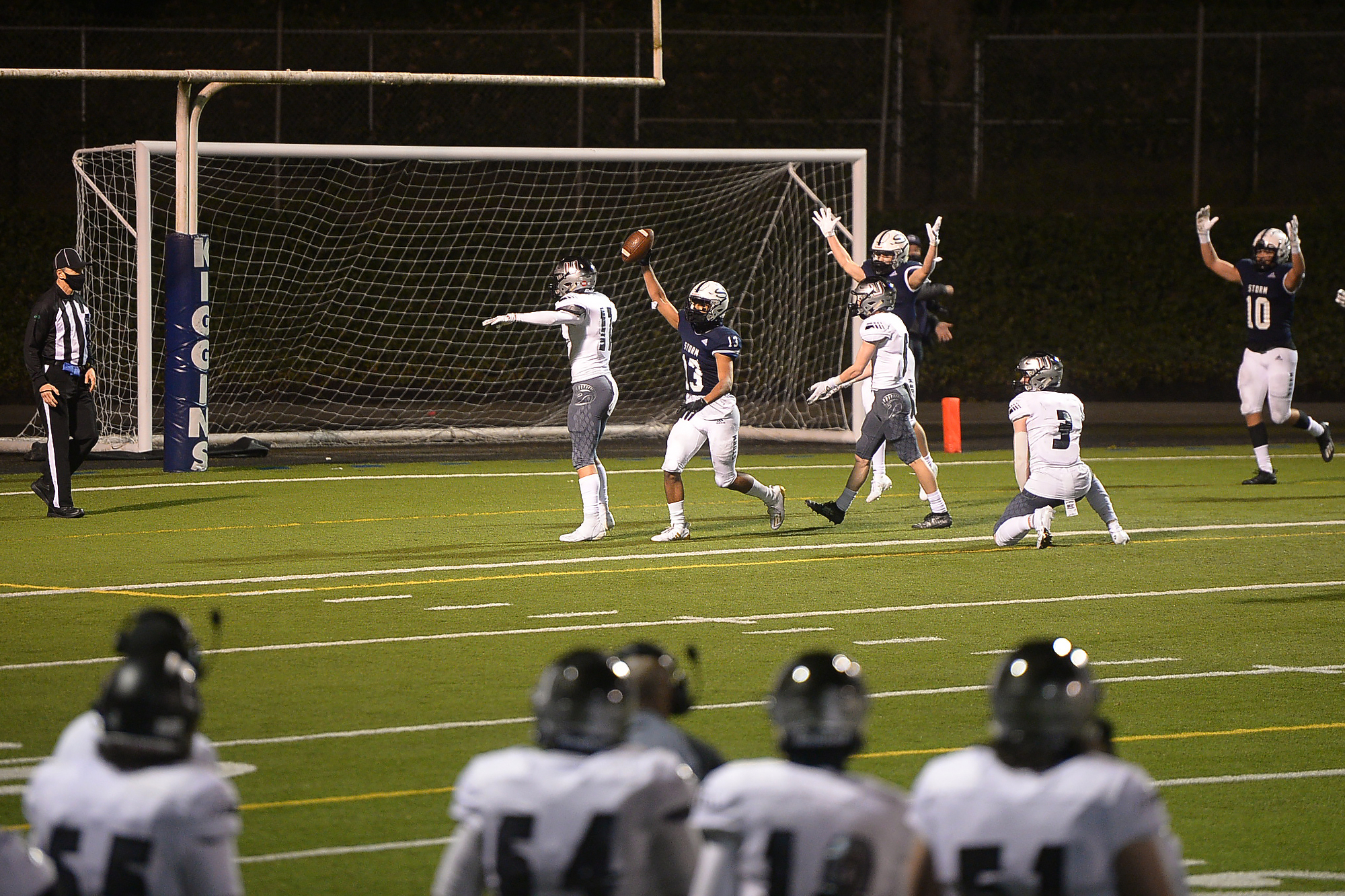 Skyview's Xavier Owens, center, celebrates a game winning touchdown against Union at Kiggins Bowl on Friday night, March 12, 2021.
