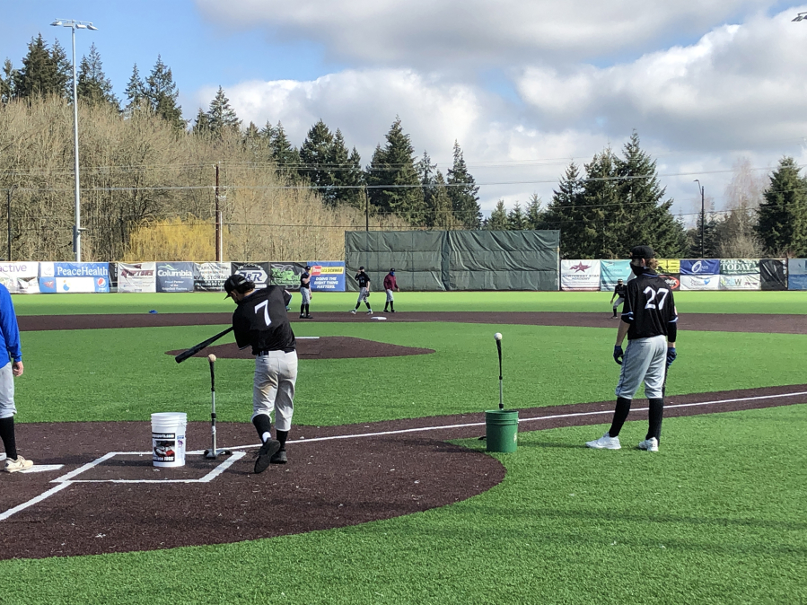 Clark College baseball players, who will compete this spring as the independent club team NW Star, run an infield drill during practice Wednesday at Ridgefield Outdoor Recreation Complex.