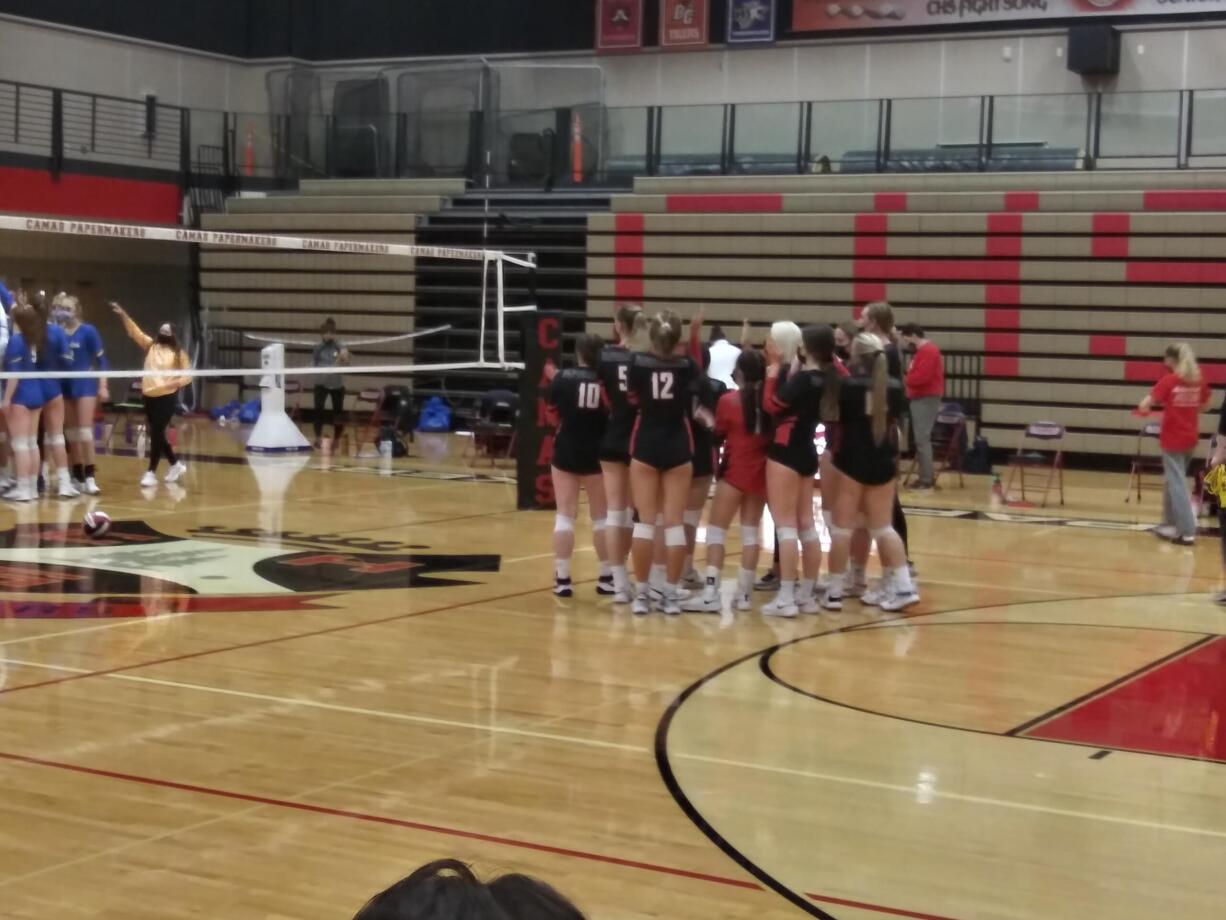 Members of the Camas volleyball team waves to Kelso players after Camas beat Kelso 3-1 on Thursday.