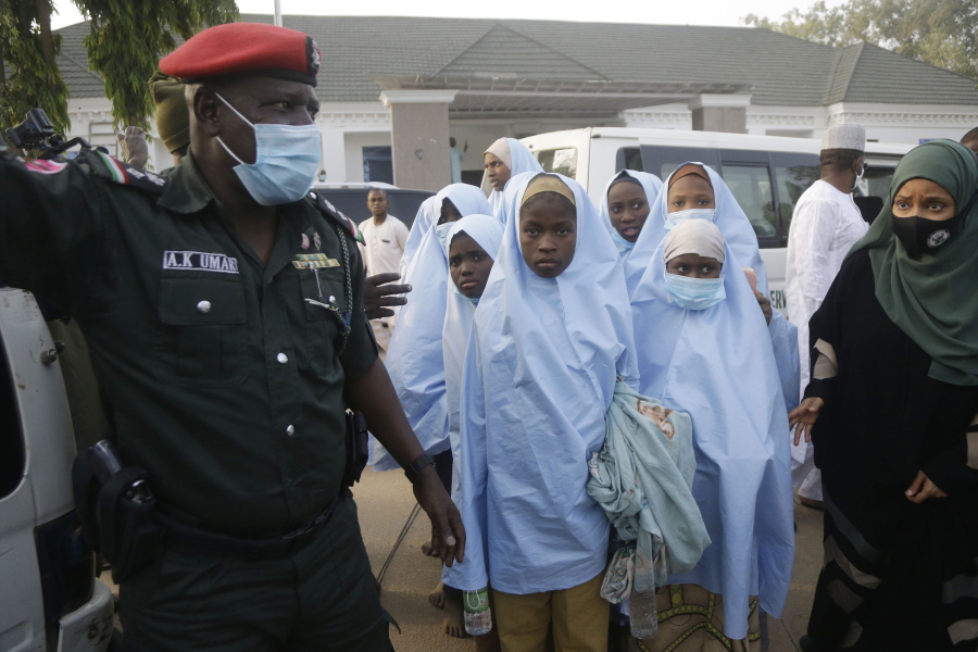 Some of the students who were abducted by gunmen from the Government Girls Secondary School, in Jangebe, last week wait for a medical checkup after their release meeting with the state Governor Bello Matawalle, in Gusau, northern Nigeria, Tuesday, March 2, 2021.
