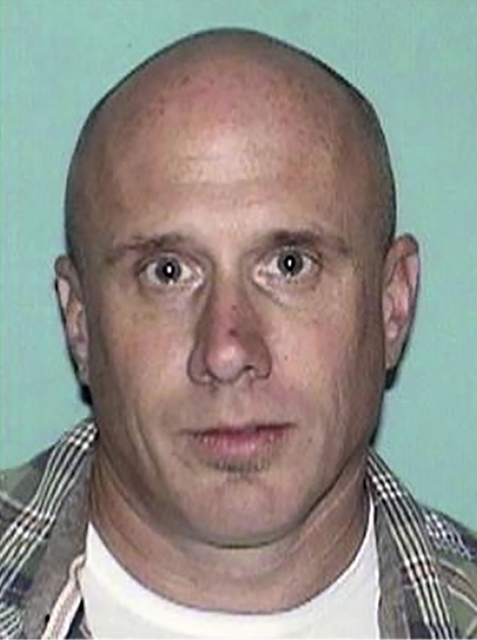 This undated photo released by the Gloucester County Prosecutor&#039;s Office shows Sean Lannon. Authorities on Wednesday, March 10, 2021, searched for Lannon, a man wanted for questioning in a homicide in New Jersey and in the slayings of four people whose bodies were found inside a vehicle parked in a New Mexico airport garage.