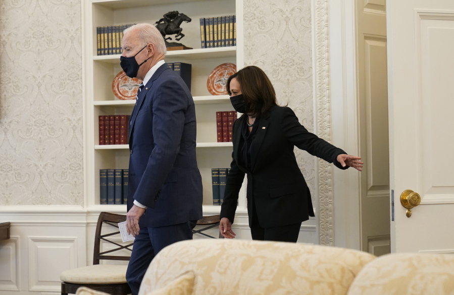 President Joe Biden and Vice President Kamala Harris, arrive at the Oval Office of the White House, Thursday, March 11, 2021, in Washington.