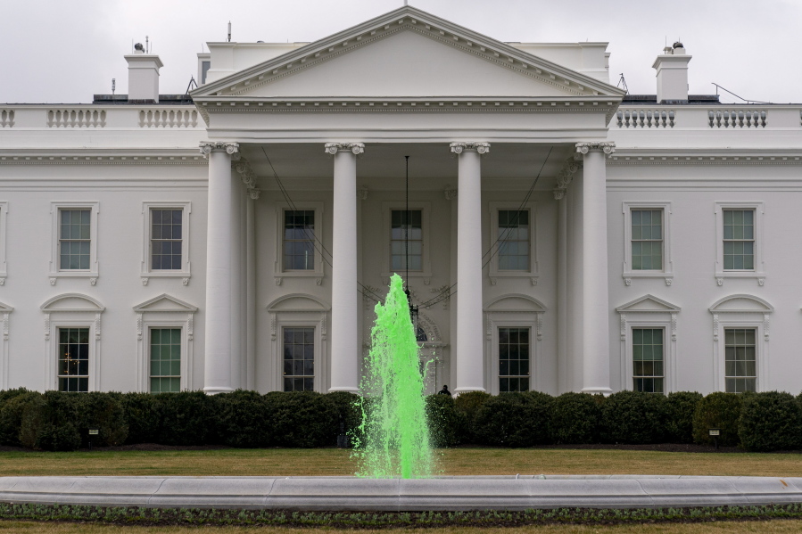 The fountain on the North Lawn of the White House is dyed green for St. Patrick&#039;s Day, Wednesday, March 17, 2021, in Washington.