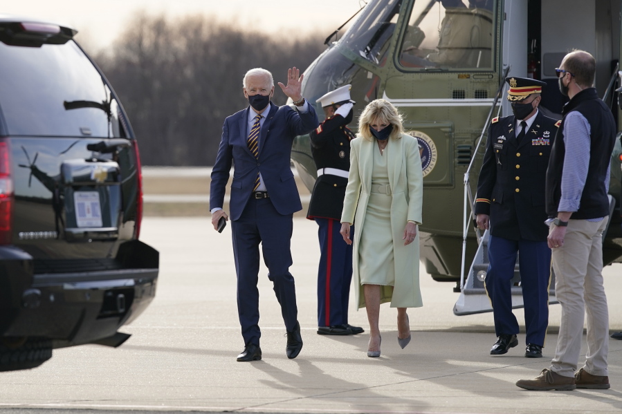 FILE - In this March 12, 2021, file photo President Joe Biden and first lady Jill Biden walk to a motorcade vehicle after stepping off Marine One at Delaware Air National Guard Base in New Castle, Del. The Bidens are spending the weekend at their home in Delaware.