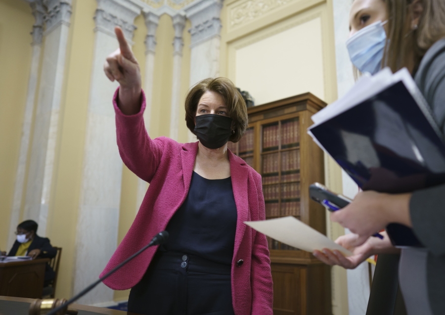 Senate Rules Committee Chair Amy Klobuchar, D-Minn., holds a hearing on the &quot;For the People Act,&quot; which would expand access to voting and other voting reforms, at the Capitol in Washington, Wednesday, March 24, 2021. The bill has already passed in the House. (AP Photo/J.