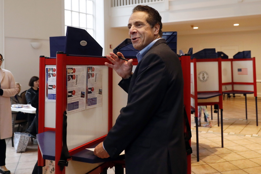 FILE -- In this Nov. 6, 2018 file photo, New York Gov. Andrew Cuomo pauses as he marks his ballot, at the Presbyterian Church of Mount Kisco, in Mt. Kisco, N.Y.  New York&#039;s attorney general has promised a thorough investigation of allegations that  Cuomo sexually harassed at least two women.