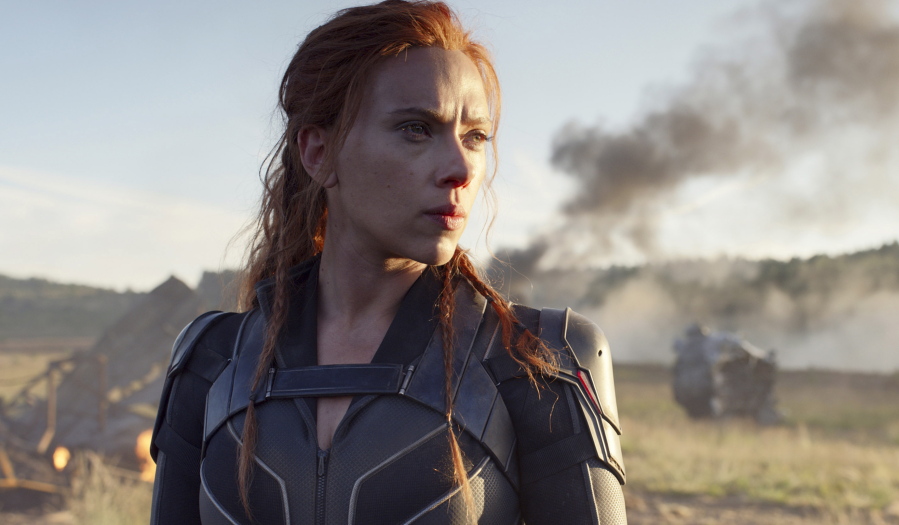 This image released by Disney/Marvel Studios&#039; shows Scarlett Johansson in a scene from &quot;Black Widow.&quot; Disney announced the film release date as July 9, 2021.