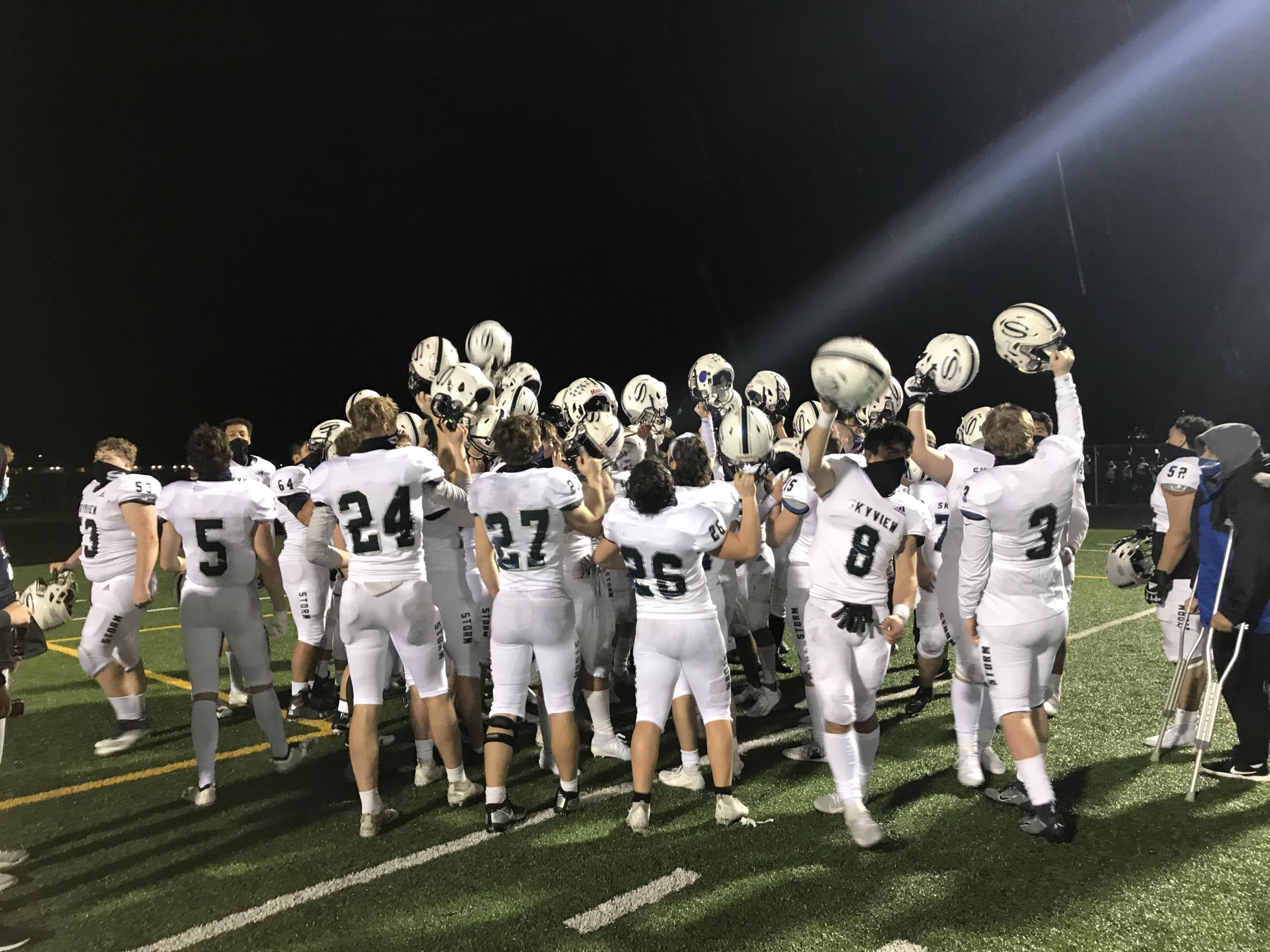 Skyview celebrates its 51-0 victory Friday over Prairie to move to 2-0 in its shortened 2021 spring football season (Meg Wochnick/The Columbian)
