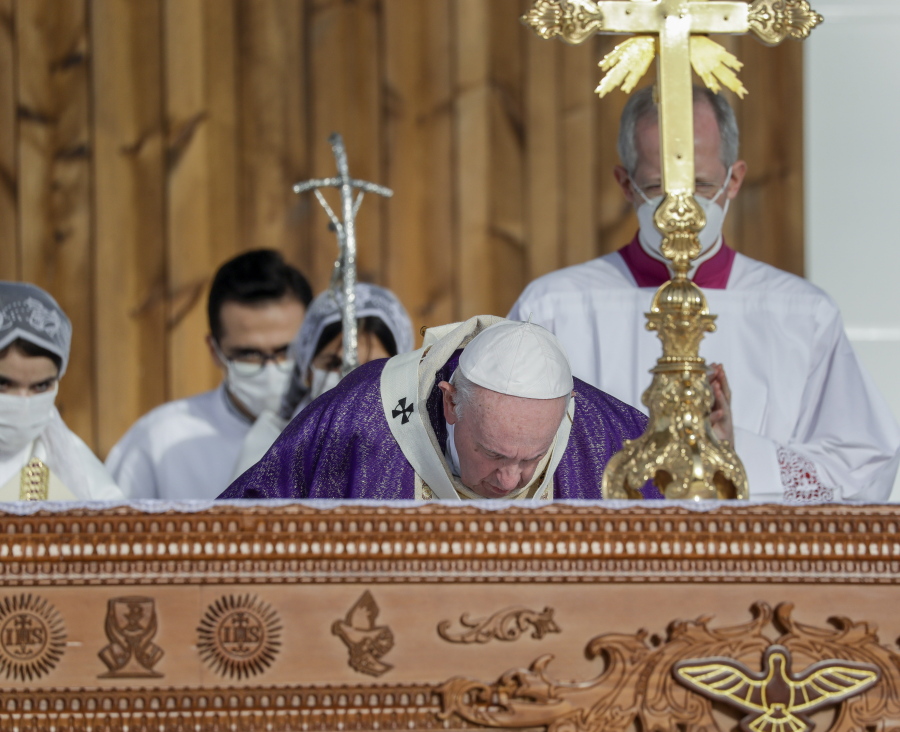 Pope Francis celebrates mass at the Franso Hariri Stadium in Irbil, Kurdistan Region of Iraq, Sunday, March 7, 2021.