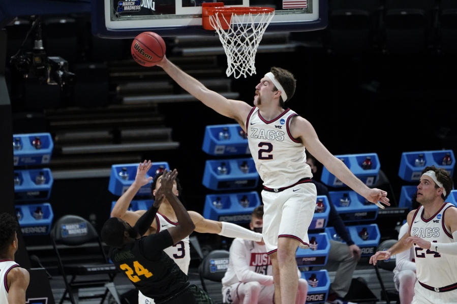 Gonzaga forward Drew Timme (2) blocks a Norfolk State guard Jalen Hawkins (24) shot during the first half of a men&#039;s college basketball game in the first round of the NCAA tournament at Bankers Life Fieldhouse in Indianapolis, Saturday, March 20, 2021.