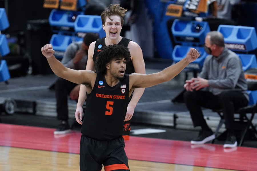 Oregon State guard Ethan Thompson (5) reacts to a basket against Tennessee during the second half of a men&#039;s college basketball game in the first round of the NCAA tournament at Bankers Life Fieldhouse in Indianapolis, Friday, March 19, 2021.
