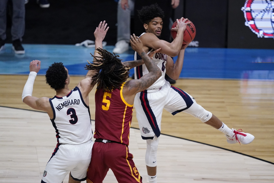 Gonzaga guard Aaron Cook, grabs a rebound over Southern California guard Isaiah White (5) during the first half of an Elite 8 game in the NCAA men&#039;s college basketball tournament at Lucas Oil Stadium, Tuesday, March 30, 2021, in Indianapolis.