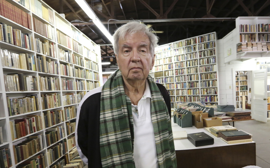 FILE - In this April 30, 2014, file photo, Pulitzer Prize-winning author Larry McMurtry poses at his book store in Archer City, Texas. McMurtry has died at the age of 84. His death was confirmed Friday, March 26, 2021, by a spokesman for his publisher Liveright.