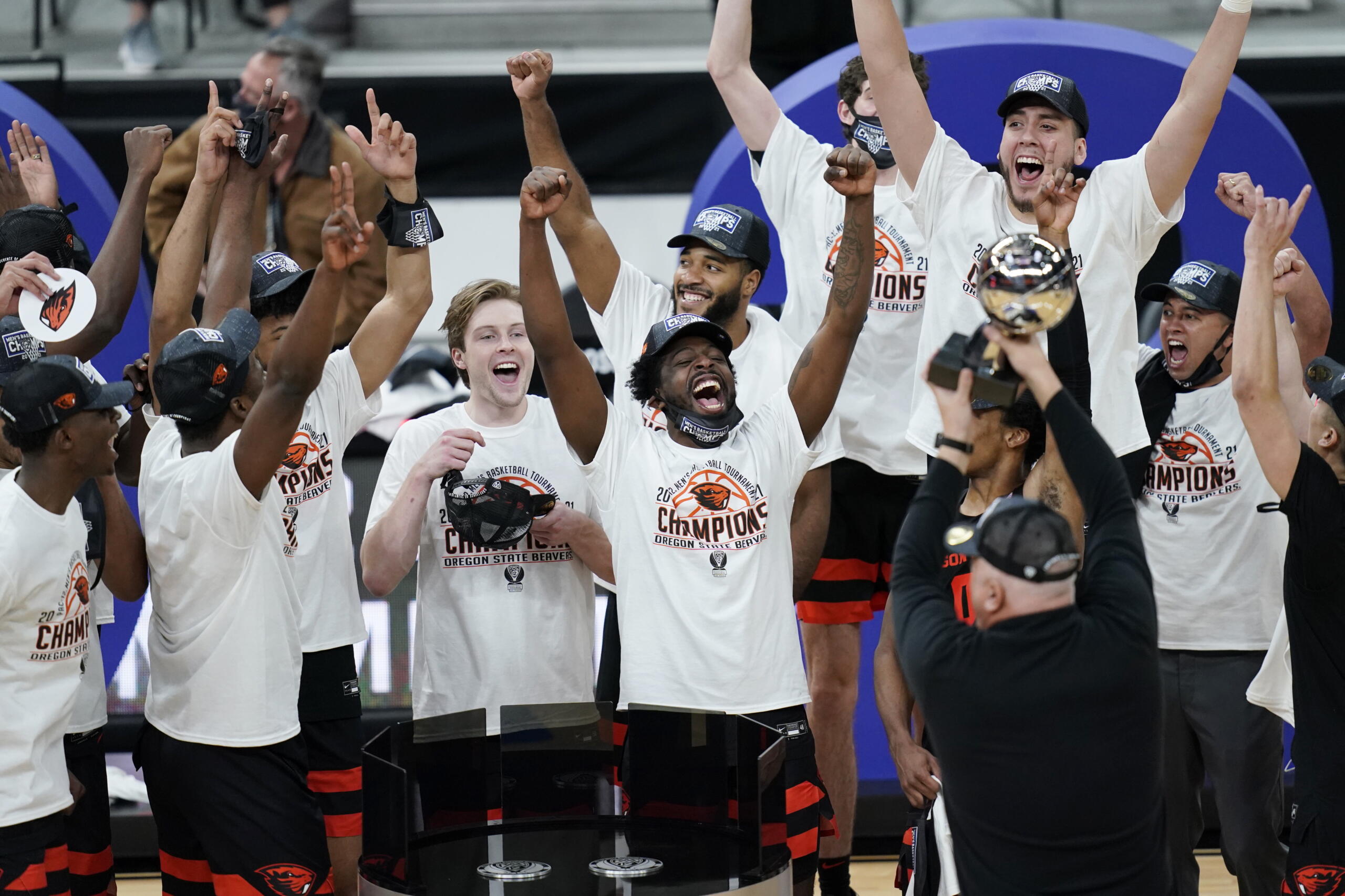 Oregon State players celebrate after defeating Colorado in an NCAA college basketball game in the championship of the Pac-12 men's tournament Saturday, March 13, 2021, in Las Vegas.