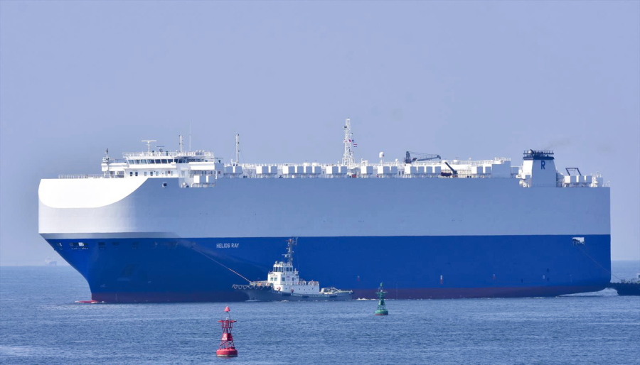 In this Aug. 14, 2020, photo, the vehicle cargo ship Helios Ray is seen at the Port of Chiba in Chiba, Japan. An explosion struck the Israeli-owned Helios Ray as it sailed out of the Middle East on Friday, Feb. 26, 2021, an unexplained blast renewing concerns about ship security in the region amid escalating tensions between the U.S. and Iran.