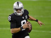 Las Vegas Raiders quarterback Marcus Mariota has agreed to take a pay cut to remain as backup quarterback for a second season for the Las Vegas Raiders, Tuesday, March 23, 2021.