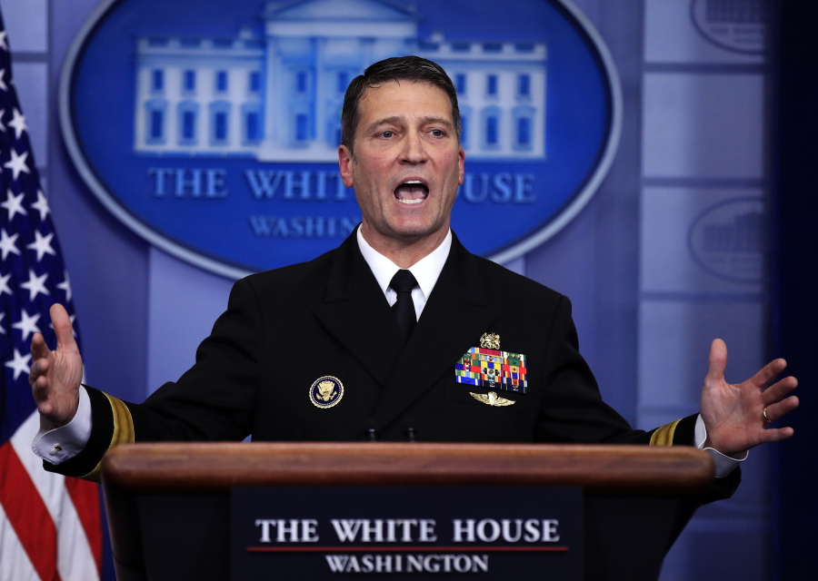 FILE - In this Jan. 16, 2018, file photo, then-White House physician Dr. Ronny Jackson speaks to reporters during the daily press briefing at the White House, in Washington. The Department of Defense inspector general has released a scathing report on the conduct of Ronny Jackson, now a congressman from Texas, when he worked as a top White House physician.