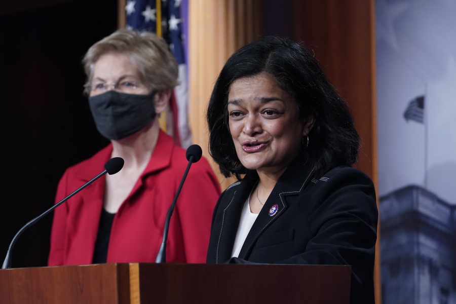 Rep. Pramila Jayapal, D-Wash., right, with Sen. Elizabeth Warren, D-Mass., at left, speaks during a news conference on Capitol Hill in Washington, Monday, March 1, 2021, to unveil a proposed Ultra-Millionaire Tax Act.