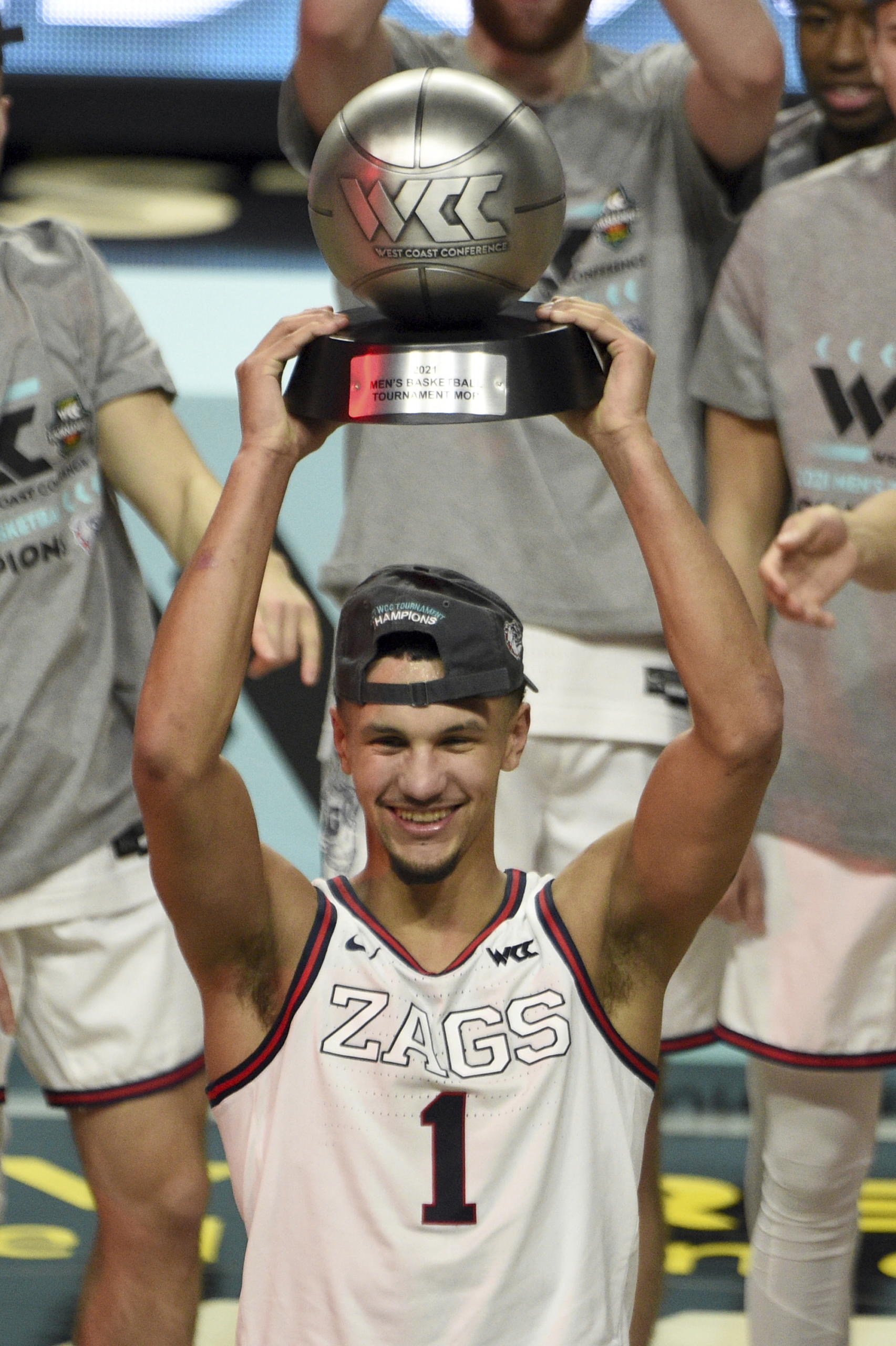 Gonzaga guard Jalen Suggs holds his most outstanding player award with his team after they defeated BYU in an NCAA college basketball game for the West Coast Conference men's tournament championship Tuesday, March 9, 2021, in Las Vegas.