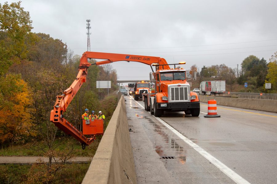 Critical infrastructure improvements, such as this work on a bridge over the Grand River near Portland, Michigan, may find funding through surplus state money in addition to any federal dollars used.