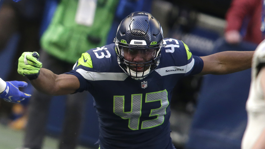 Seattle Seahawks defensive end Carlos Dunlap II (43) in action against the Los Angeles Rams during the first half of an NFL football game, Sunday, Dec. 27, 2020, in Seattle.