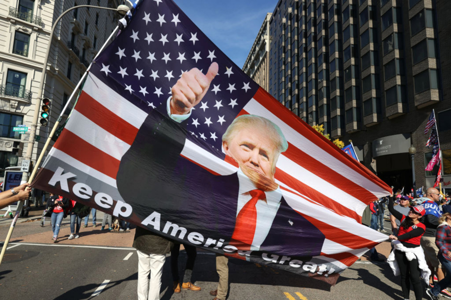 People participate in the &quot;Million MAGA March&quot; from Freedom Plaza to the Supreme Court, on November 14, 2020 in Washington, DC.
