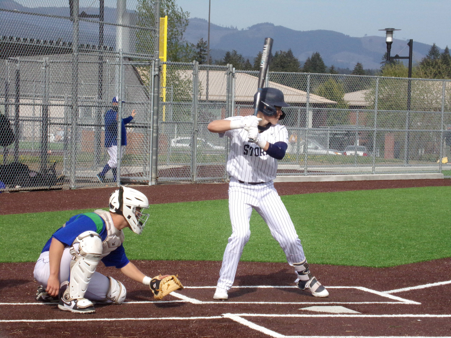 Skyview'is Kyle Olson stands at the plate while Mountain View catcher Riley McCarthy awaits the pitching during Monday'is game at Union High School.