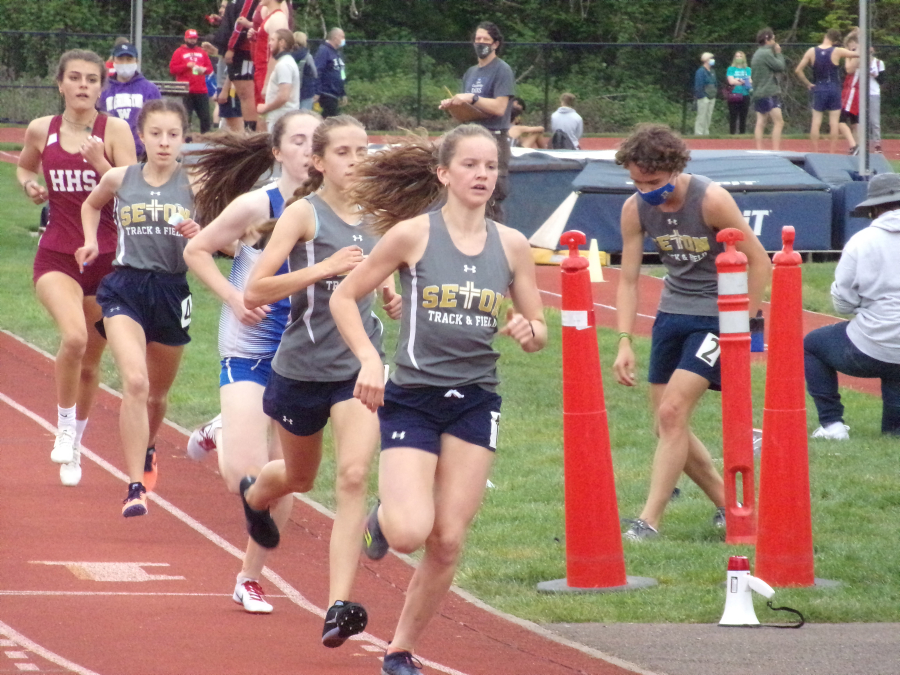 La Center's Lara Carrion lead the pack in the girls 1,600 meters at the 1A district track and field meet on Friday, April 30, 2021. Carrion went on to win the race in 5:13.97.