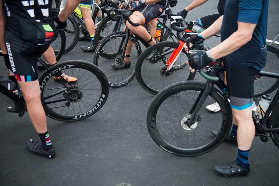 Cyclists take a break from the 2019 Ride Around Clark County event at a Ridgefield fire station. The ride will be back this year in modified form, organizers with the Vancouver Bicycle Club say.