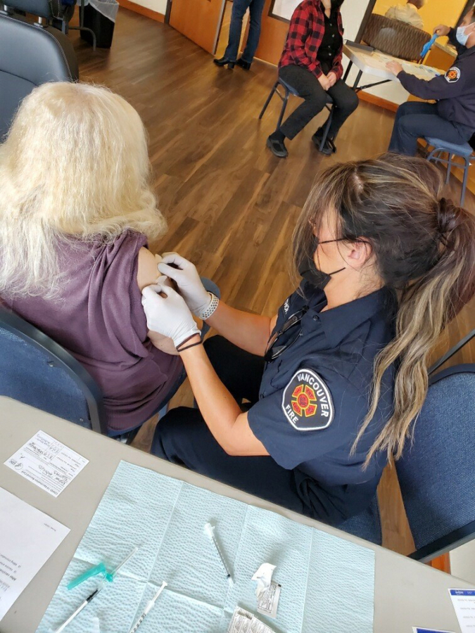 CLARK COUNTY: Members of the Vancouver Fire Department are helping at various sites with the COVID-19 vaccine rollout.