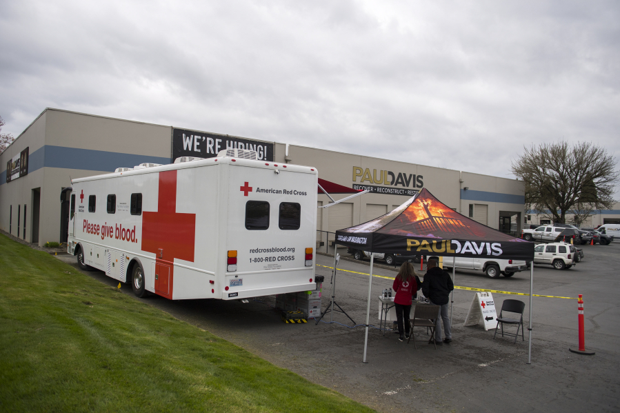 The American Red Cross teamed up with Paul Davis Restoration of Portland/Vancouver for a blood drive Wednesday in Vancouver in response to blood shortages caused by the COVID-19 pandemic. The Red Cross needs a constant supply of blood.