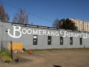 Boomerang Therapy Works is moving to a new location next month because its current building is set to be demolished to make way for an apartment building. The taped-off section of the exterior wall was where a car drove into the building recently.