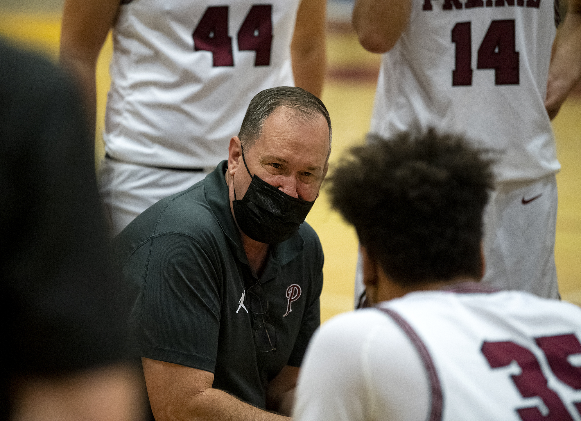Prairie coach Kyle Brooks talks to his team during a timeout in a 4A/3A Greater St. Helens League boys basketball game on Tuesday, April 20, 2021 at Prairie High School. Tuesday marked Brooks’ return to coaching after missing last season as he battled Guillain-Barré syndrome.