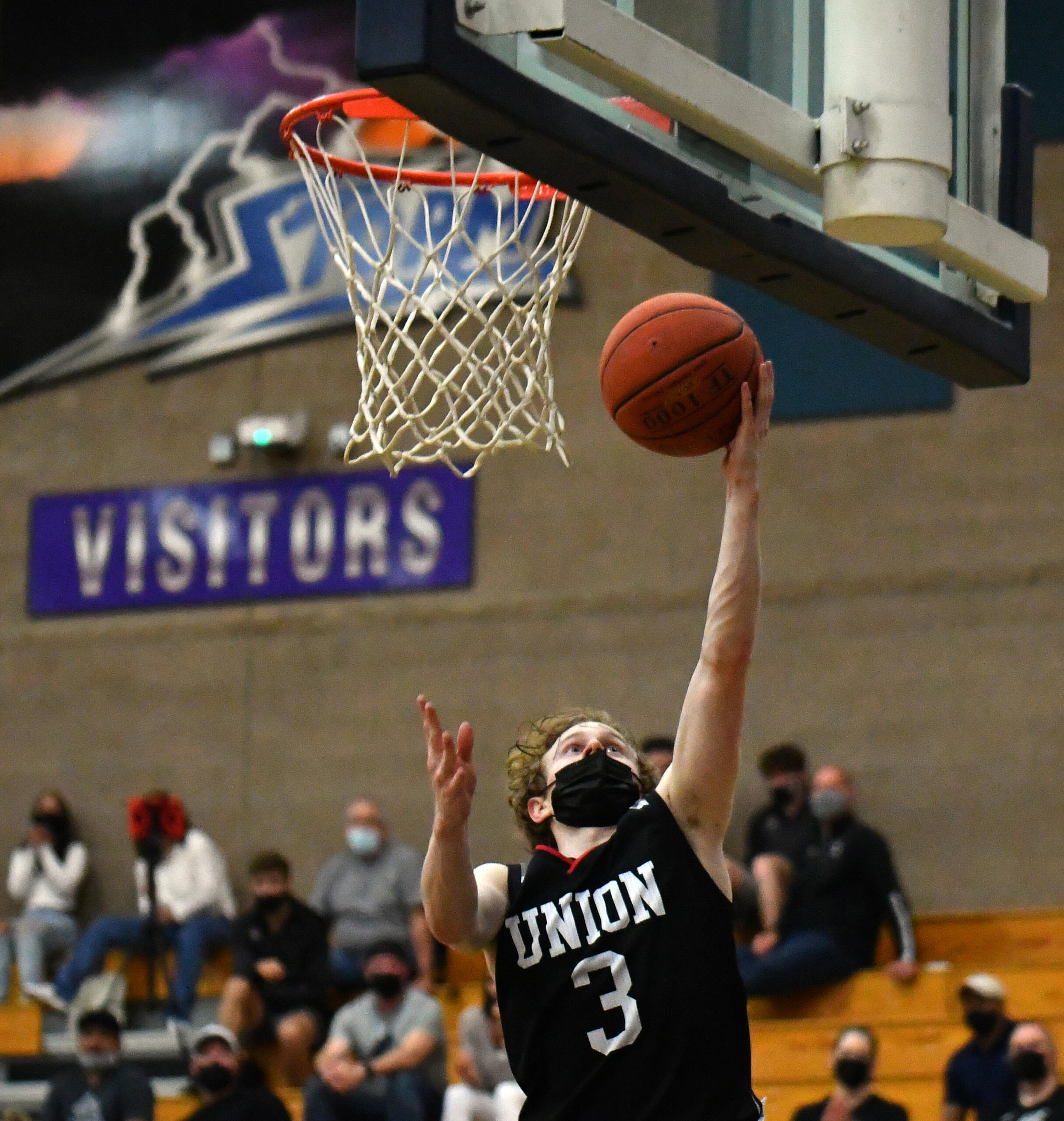 Union High School junior Bryson Metz shoots the ball Tuesday, April 27, 2021, during the TitanÕs 79-71 win against Skyview at Skyview High School.